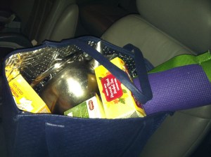 Packing for the writing retreat. This year's necessaries: yoga mat & teapot.