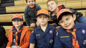 Tiger Cubs watching the game (Greg is so not amused that his daddy is blocking his view path).