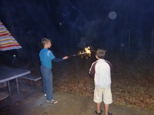 Setting off some small fireworks to get the night started.