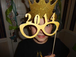 We loved glittering up these photo booth props. (We found them online and cut them out ourselves.)