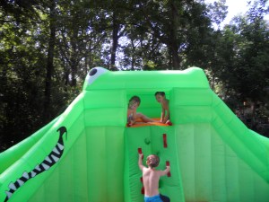 One day a friend called and asked us over right that minute to help try out an inflatable water slide they got for a party. Of course we went right over!